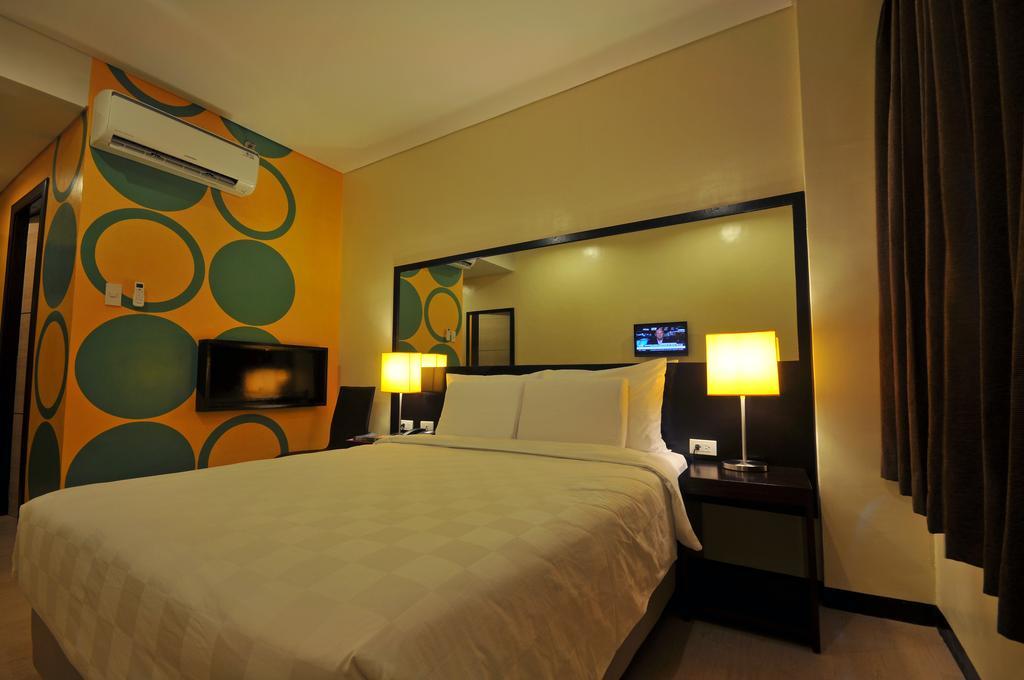 Go Hotels Puerto Princesa Szoba fotó