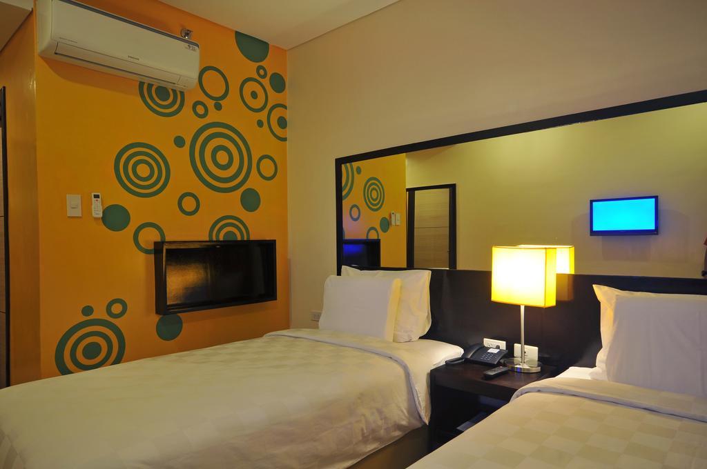 Go Hotels Puerto Princesa Szoba fotó